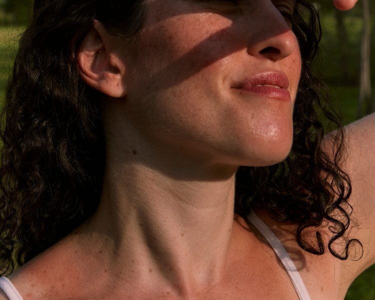 Portrait of Sunburnt Woman Outdoors